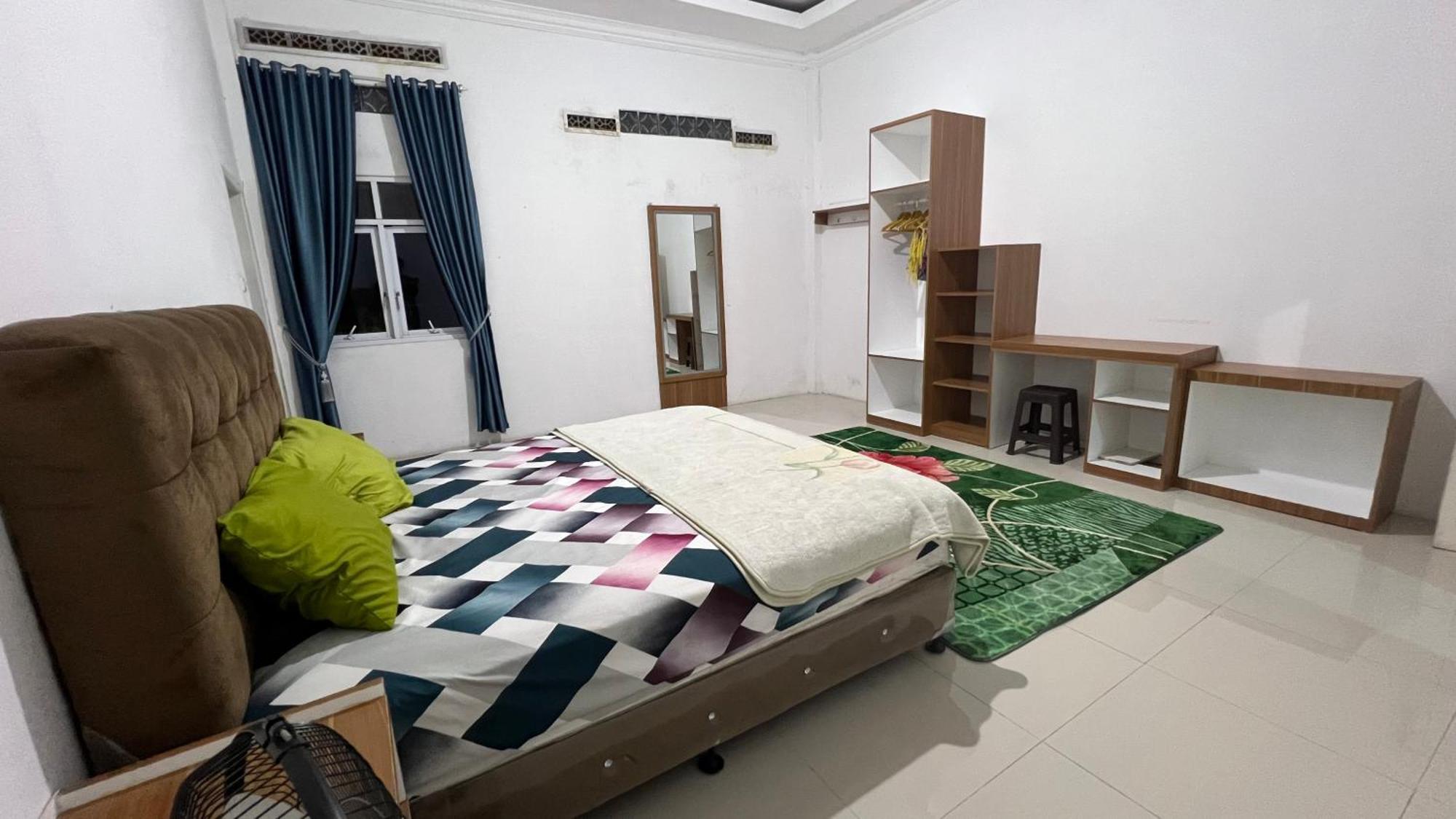 Rumah 25 Syariah Букиттинги Номер фото